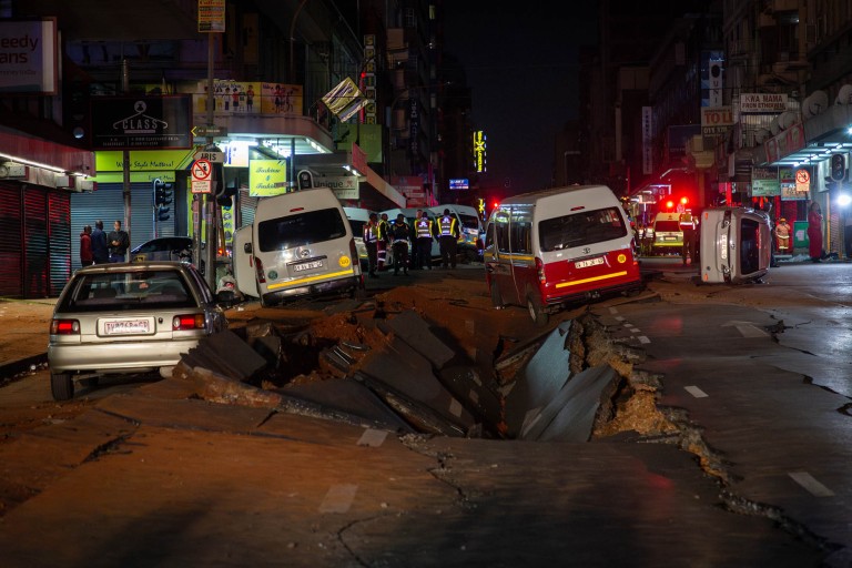 Authorities investigate the cause of the earth-shattering explosion on Bree Street.