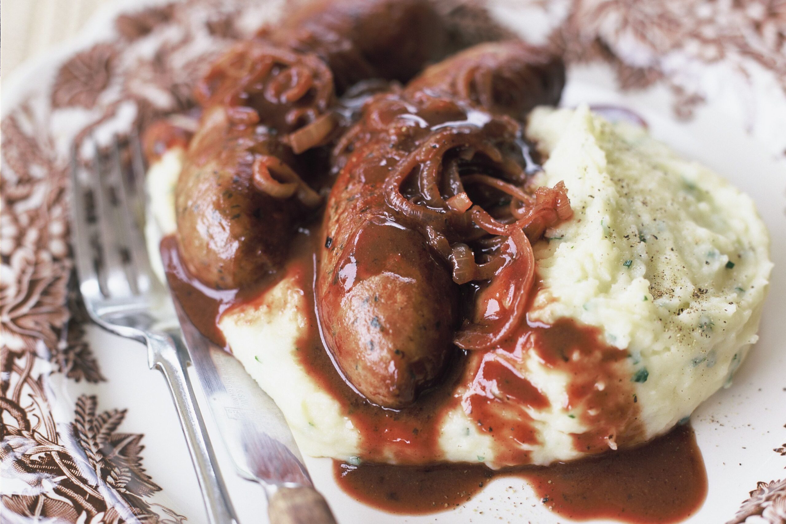 Sausages with onion gravy and aligot