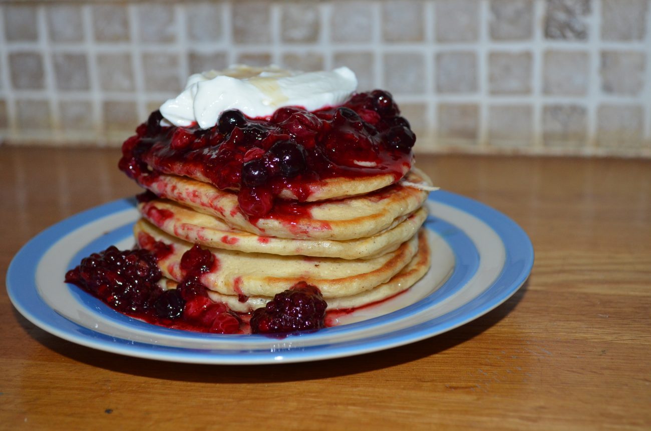 Fluffy American pancakes with cherry-berry syrup