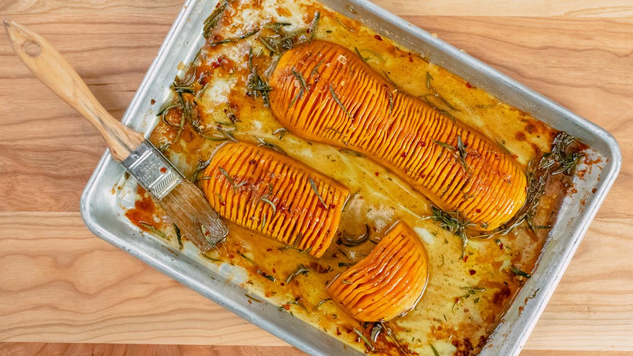 Hasselback butternut squash with chestnuts, pomegranate and tahini