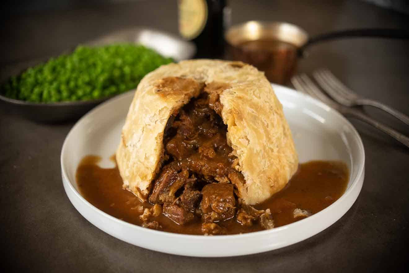 Steak and kidney pudding with steak and kidney gravy
