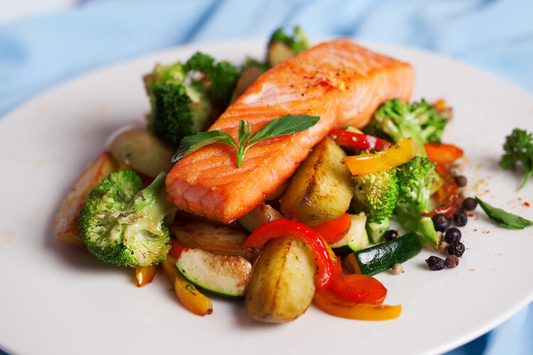 Steam-roasted salmon and broccoli with barbecued new potatoes