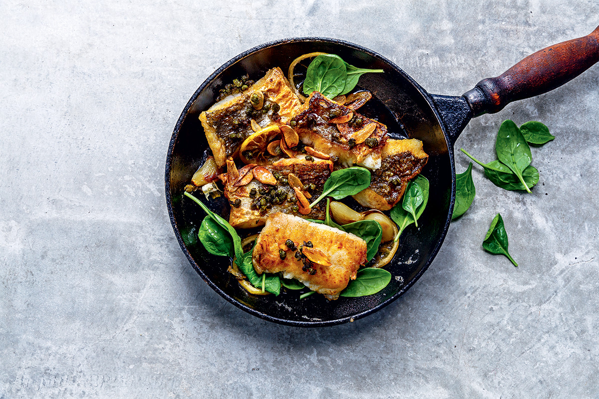 Pan-fried hake with caper and lemon butter sauce