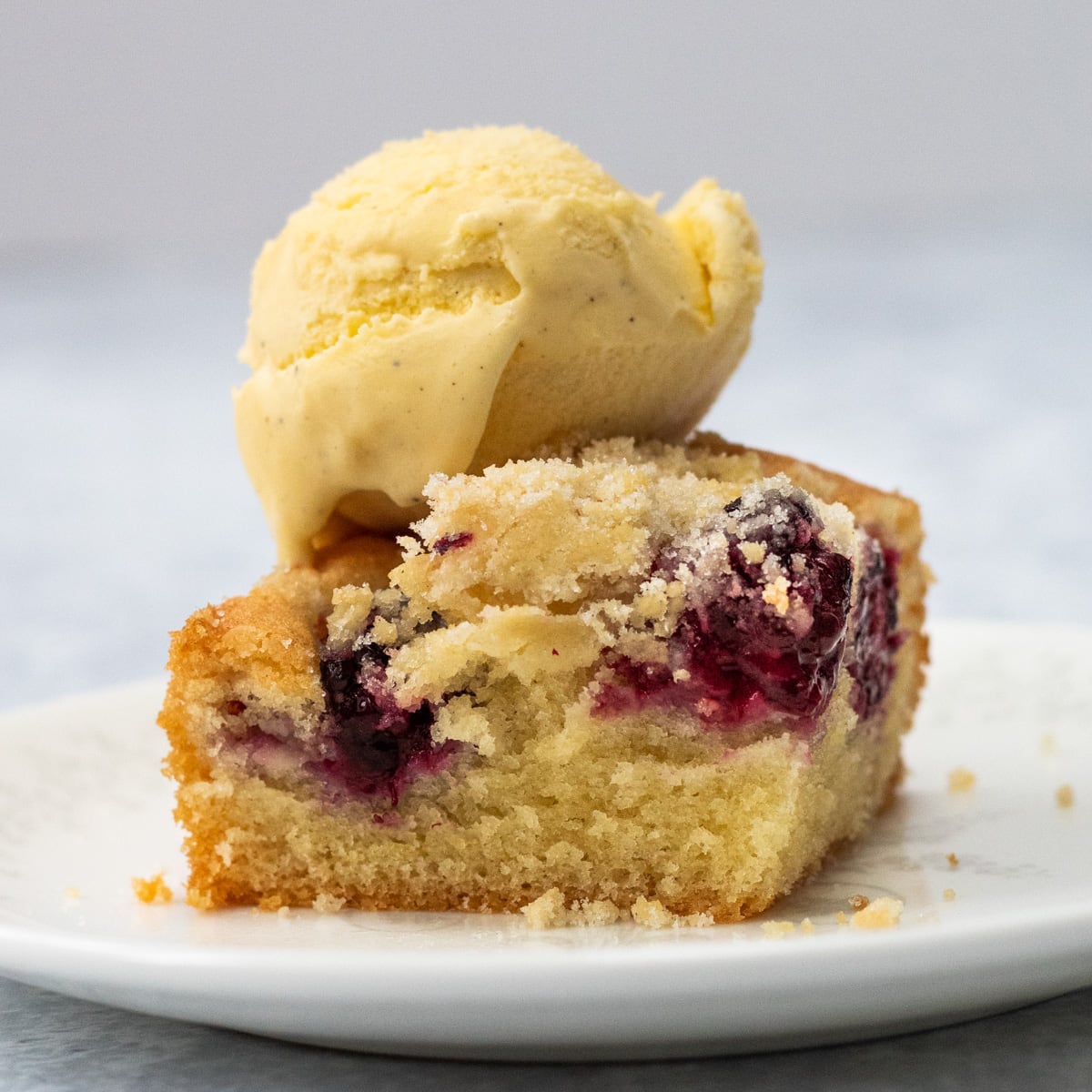 Blackberry crumble cake with pistachio custard