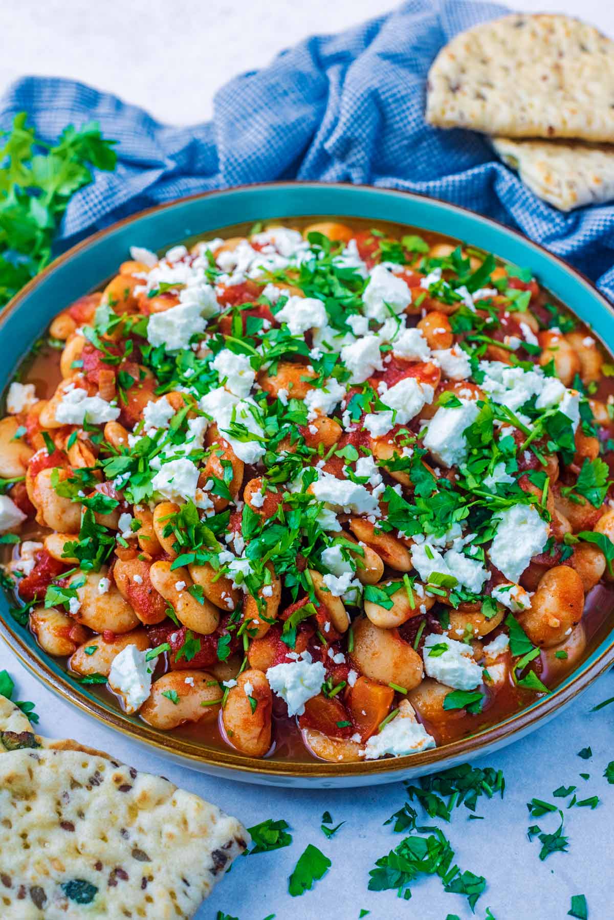 Gigantes with tomatoes and greens