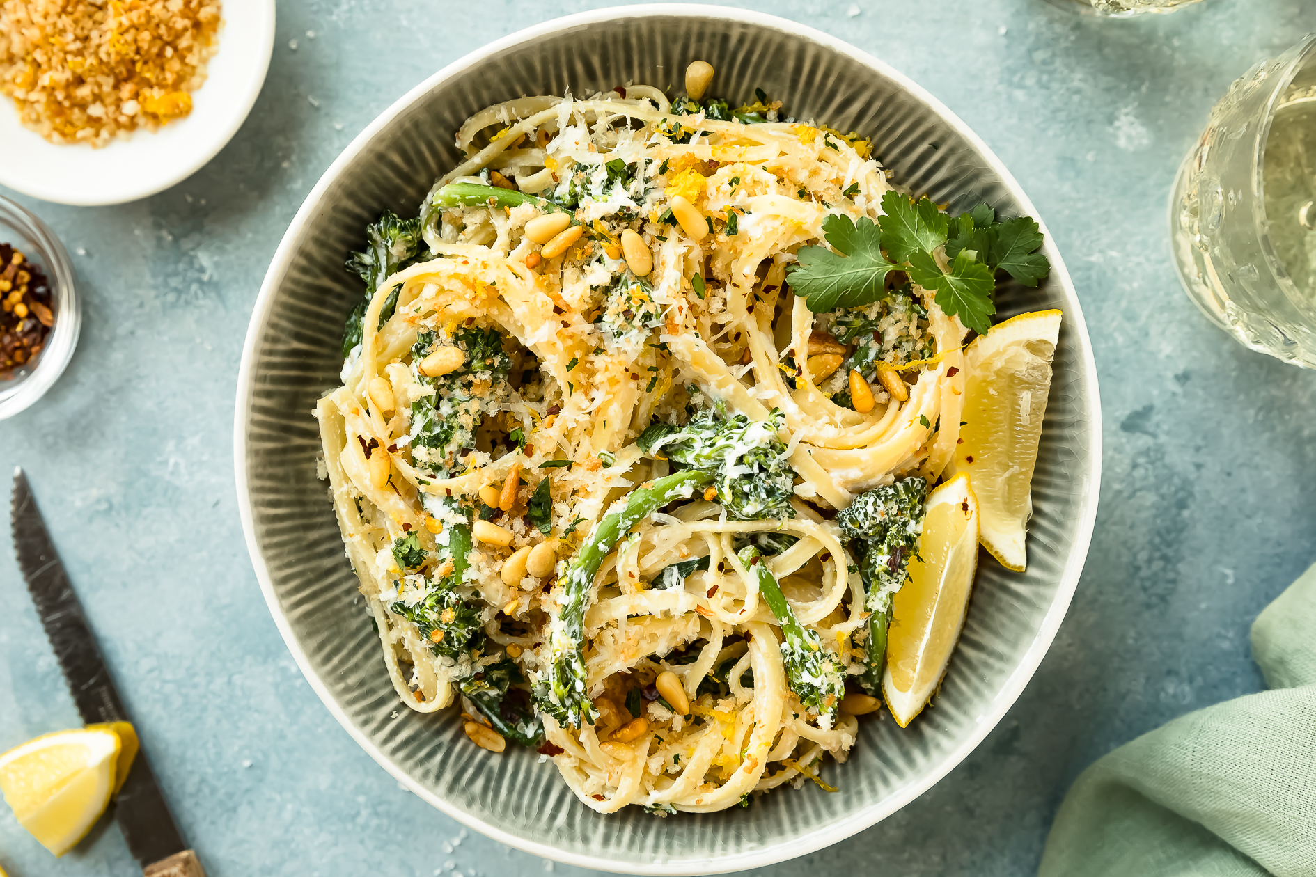 Creamy pasta with broccoli, peas and lemon