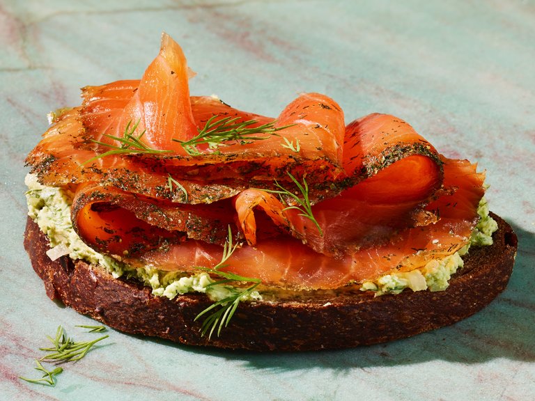 Homemade gravad lax with cucumber salad and mustard sauce