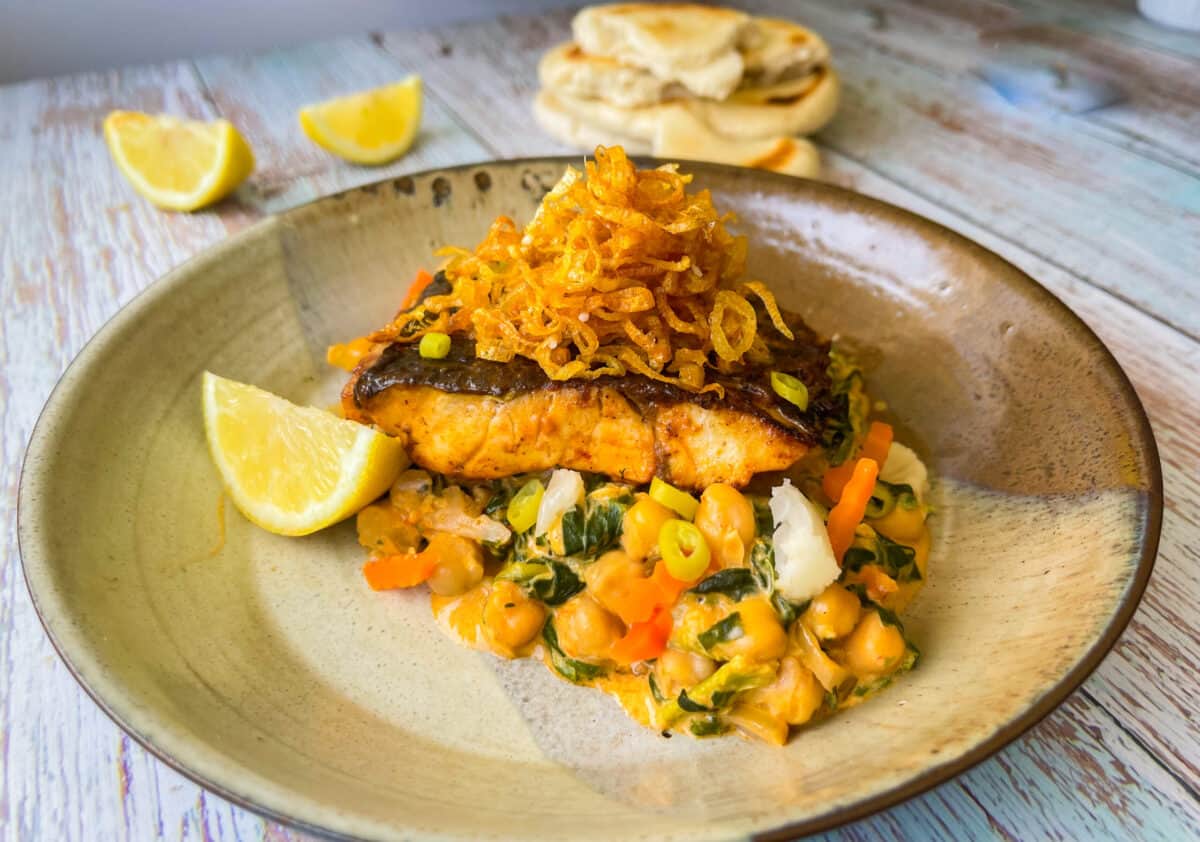 Pan-fried sea bass in harissa butter